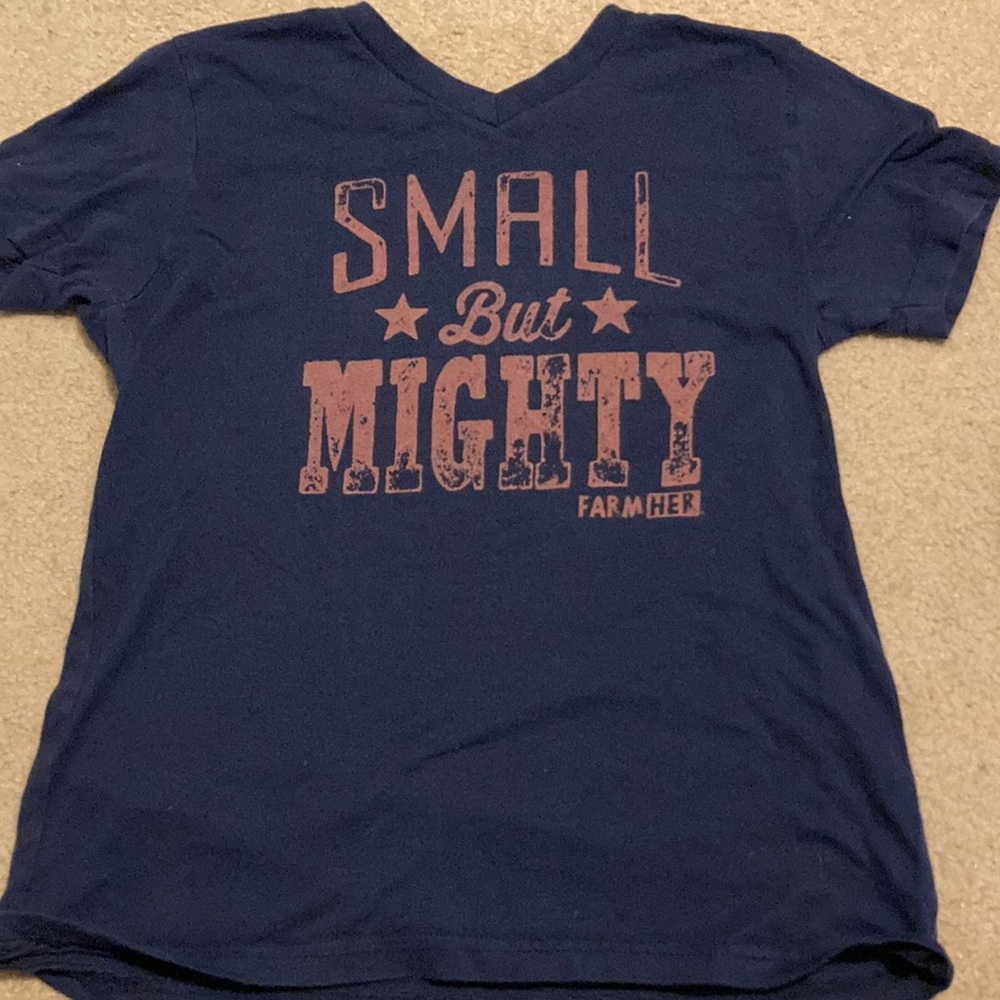 Small but might farmher t-shirt. Dark blue with pink text. Used lightly. Medium